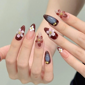 3D floral press-on nails with wine red and cat eye blue french almond tips