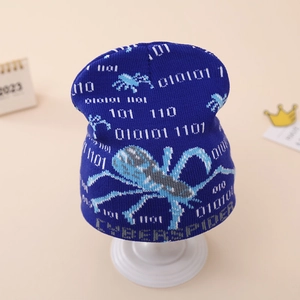 Detail of blue knit hat showing Cyber Spider text and binary code jacquard pattern