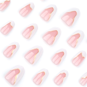 Short almond press-on nails with white French tips and gold wave lines in a set