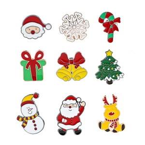 Set of 9 festive Christmas enamel brooches featuring Santa, reindeer and snowflakes