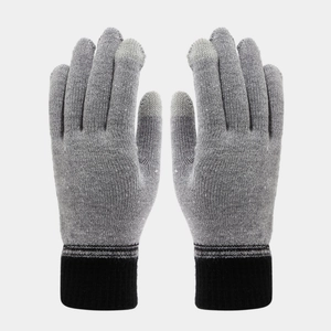 Close-up of thick knit gloves with grey touch screen fingertips and ribbed cuffs