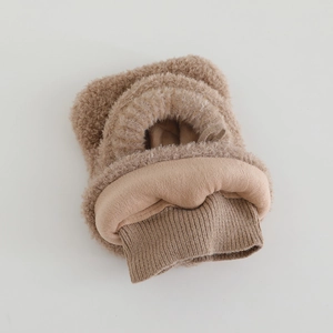 Detail of soft khaki fleece lining and ribbed knit hem on winter warm plush neck warmer