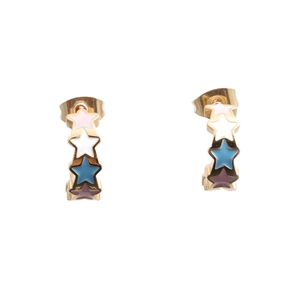 Detail of gold-plated hoop earrings with colorful enamel star charms in pink and blue