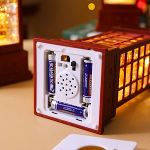 Detail of the bottom battery compartment with three AA batteries for Santa glitter lantern