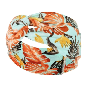 Detail view of tropical leaf print headband with soft elastic fabric and twist knot design