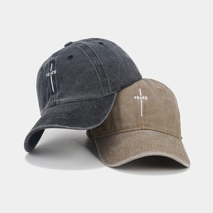 Vintage washed cotton baseball caps in dark grey and khaki with PEACE embroidery