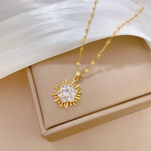 Titanium steel necklace featuring a sparkling sunflower pendant with crystal rhinestones