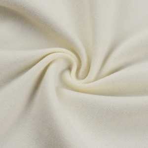 Vue macro détaillée de la texture douce du tricot en cachemire de couleur crème