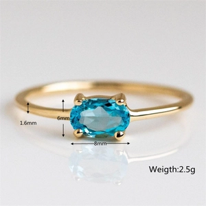 Detail showing dimensions of 6x8mm oval blue gemstone gold ring weighing 2.5g