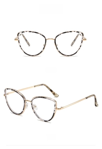 Detailed front and side views of gold cat-eye metal glasses with tortoiseshell accents