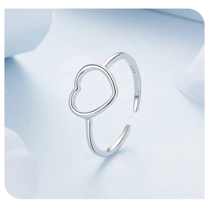 Detail shot of the hollow heart design on a polished S925 sterling silver open ring