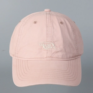Detail shot of pink washed cotton baseball cap featuring white Coldsborate embroidery