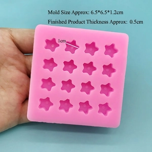 Detailed size view of pink 16-cavity star silicone mold for DIY crafts and baking