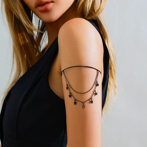 Gothic black multi-layer arm cuff featuring star charms and cross crystal chains for women