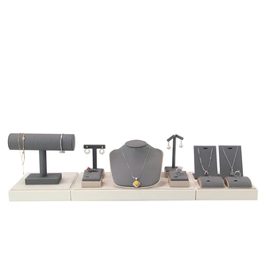 Professional grey velvet jewelry display set with necklace bust and bracelet holder