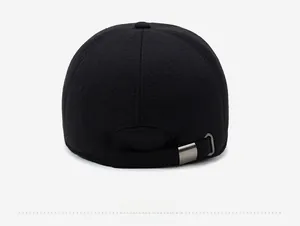 Detail showing the adjustable metal buckle and woven texture on the back of the black cap