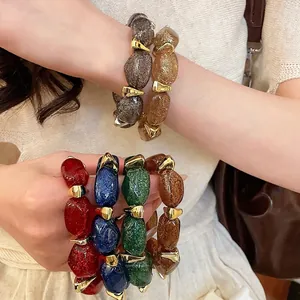 Acrylic oval beaded bracelets with glitter resin stones and gold accents for women