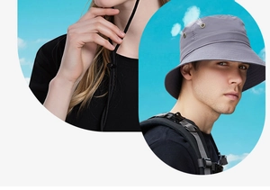 Détail du chapeau de soleil extérieur gris avec aérations et cordon coupe-vent réglable