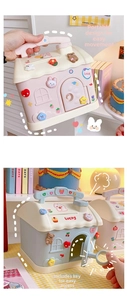 Detail view of pink house piggy bank handle and key lock mechanism with cute 3D stickers