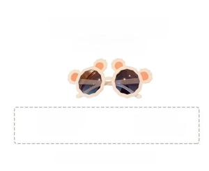 Macro detail of cute white bear-ear sunglasses for children with dark UV protective lenses