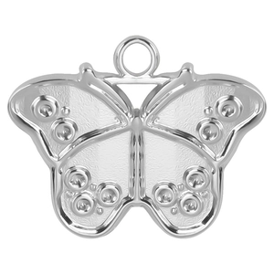 Macro detail of silver butterfly pendant with textured wings and embossed metal finish