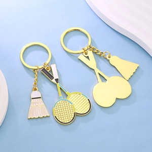 Creative badminton keychain with mini shuttlecock and racket in gold alloy finish