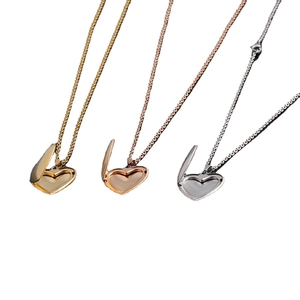 Polished 316L stainless steel heart locket necklaces in gold, rose gold, and silver finishes