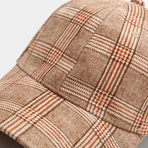 Classic brown plaid baseball cap featuring thick tweed texture and six-panel construction