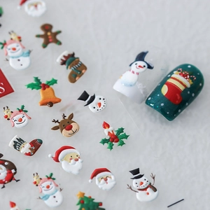 3D embossed Christmas nail stickers featuring Santa, snowman, and reindeer patterns
