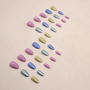 Short almond press-on nails set with aurora shimmer in pink, purple, blue, and gold