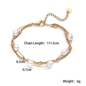 Double-layered 18K gold plated stainless steel bracelet with white baroque pearls