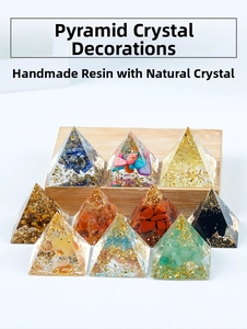 Detailed collection of handmade crystal pyramid energy stones with diverse resin fillings