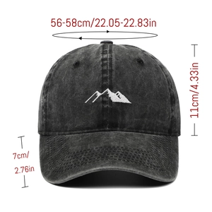 Detail showing dimensions and mountain embroidery on distressed gray baseball cap