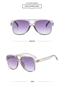 Detail view of double bridge pilot sunglasses with gray frame and gradient purple lenses