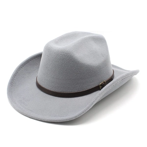 Detail of light grey wool fedora hat featuring a brown leather band and gold buckle