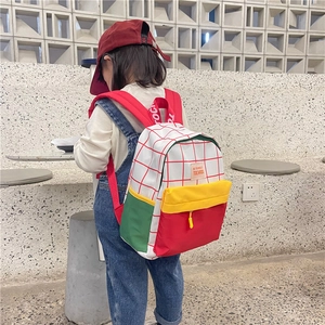 Kids color-block canvas backpack with red and white grid pattern for school and travel