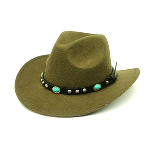 Close-up of brown wool felt cowboy hat with turquoise gemstone and metal stud headband
