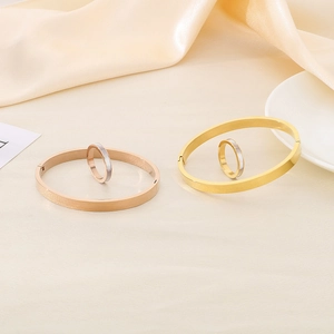 Minimalist shell stainless steel bracelet and ring jewelry set in gold and rose gold finishes