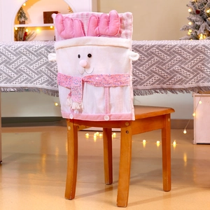 Detailed plush pink Christmas chair cover featuring reindeer antlers and sequins decor
