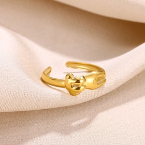 Macro shot of 18k gold plated open ring with abstract sculptural design details