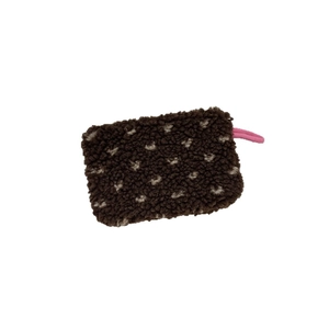 Brown sherpa fleece coin purse with white polka dots and a pink elastic strap