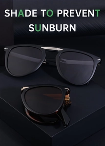 Macro view of black foldable sunglasses showing detailed silver hinge and compact fold