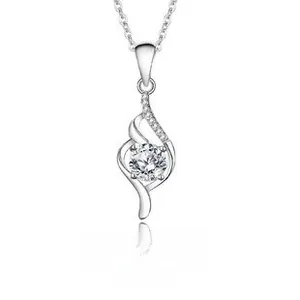 Detail of S925 silver necklace featuring a brilliant round zircon in a curved pendant
