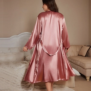 Elegant dusty pink satin long-sleeve bathrobe for women with a silky finish and waist tie