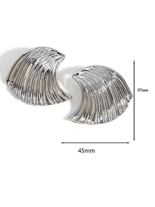 Detailed view of silver wave textured fan-shaped earrings measuring 37mm by 45mm