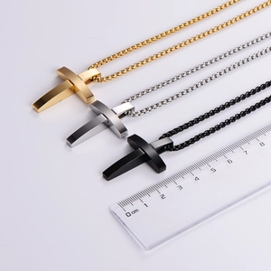 Minimalist stainless steel cross necklaces in gold, silver, and black with size reference