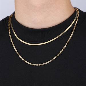 Detail of 18k gold plated herringbone and rope chain double layered necklace set