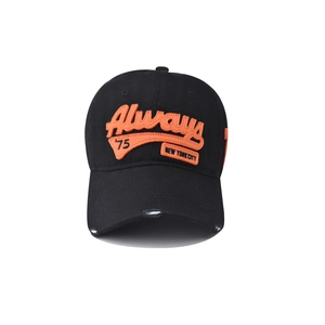Detail of orange 3D embroidery and distressed brim on a premium black cotton baseball cap