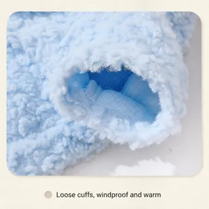 Detail of loose cuffs on a light blue plush pet sweater for windproof joint protection