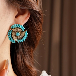 Vintage gold earrings with turquoise and rhinestones in a bohemian floral design